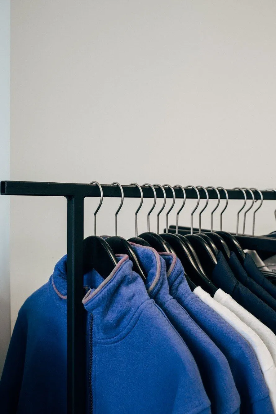 Shop fittings and mannequins displaying clothing in a retail store